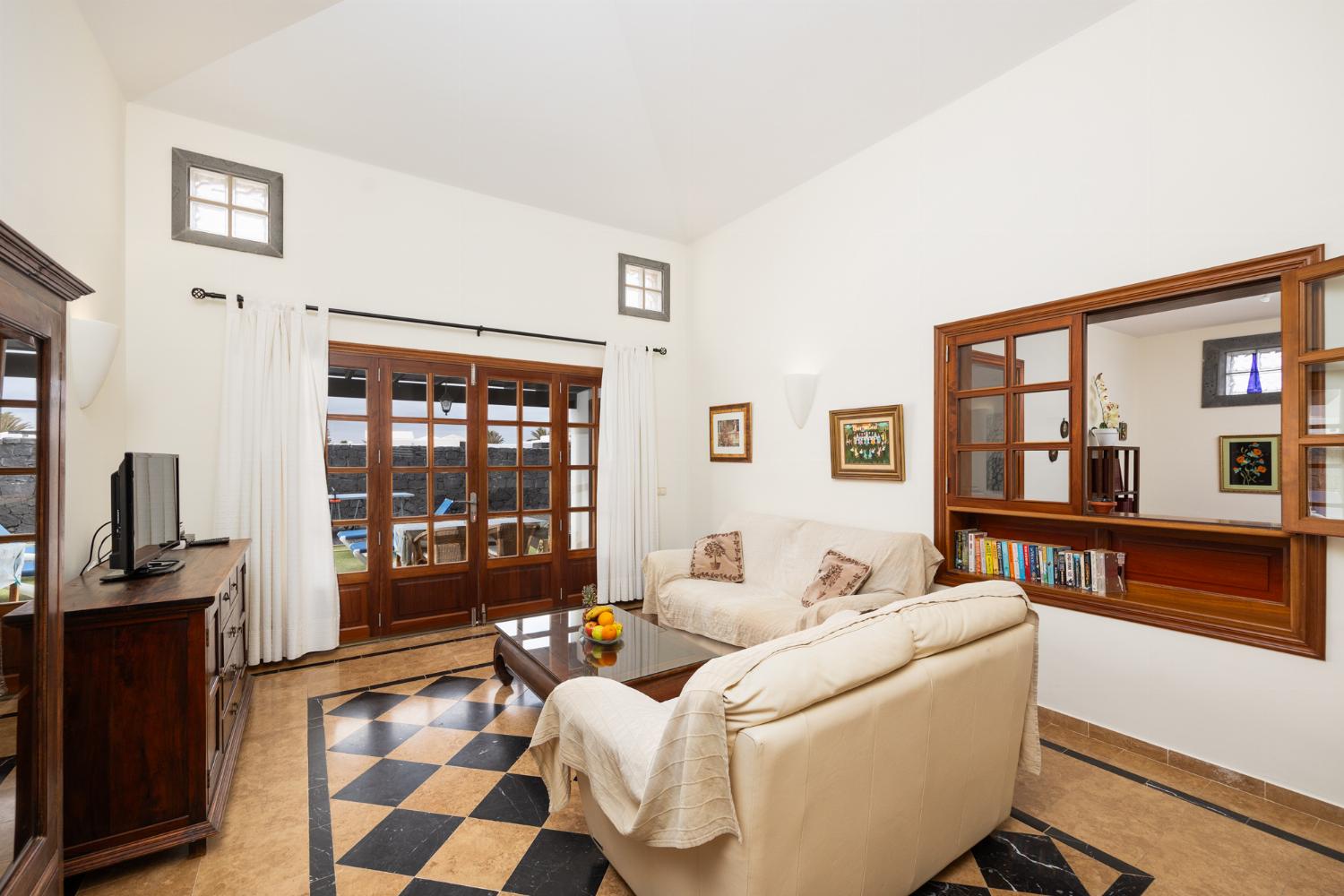 Living room with sofas, WiFi internet, and satellite TV