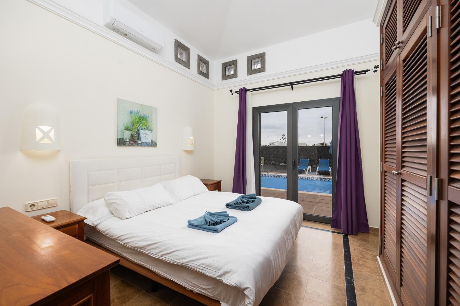 Double bedroom with en suite bathroom and A/C