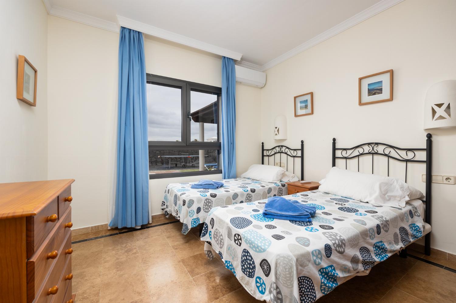 Twin bedroom with A/C