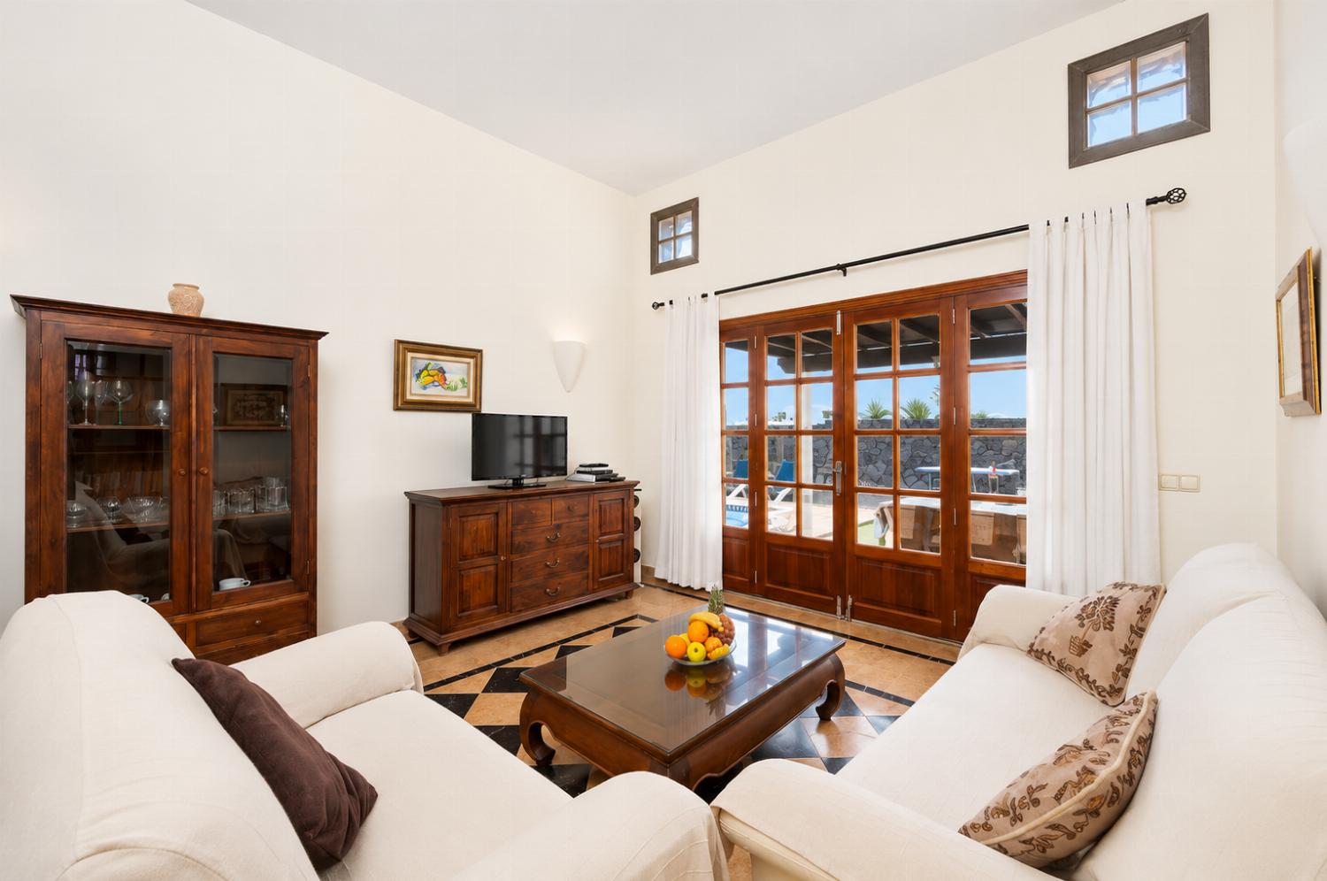 Living room with sofas, WiFi internet, and satellite TV