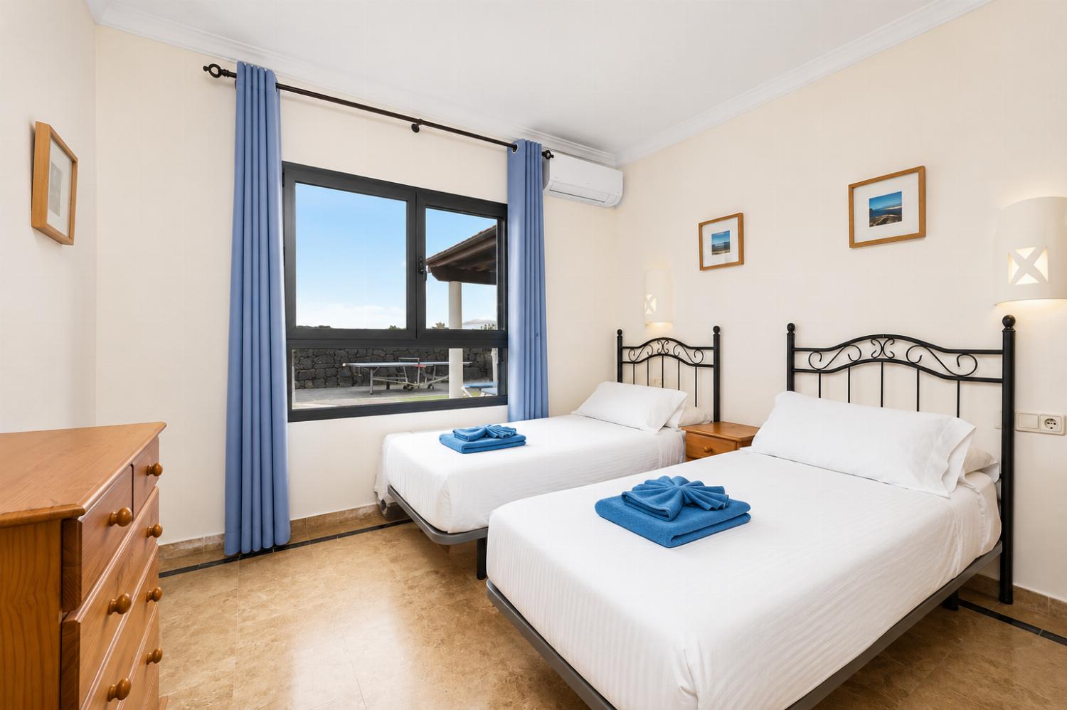 Twin bedroom with A/C