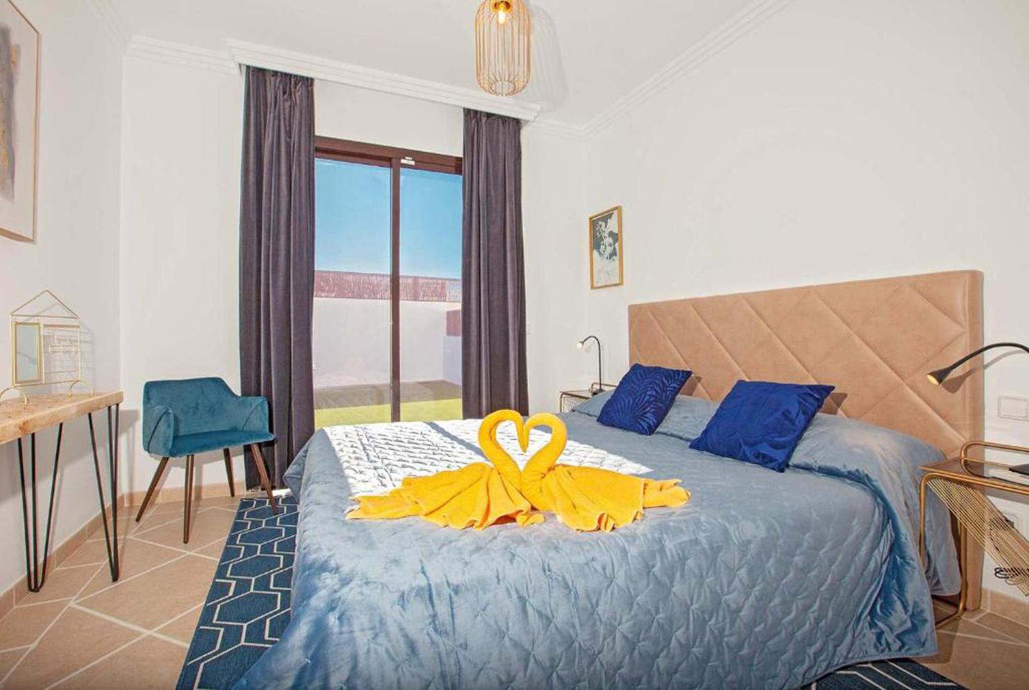 Double bed bedroom with A/C  en suite bathroom and terrace access
