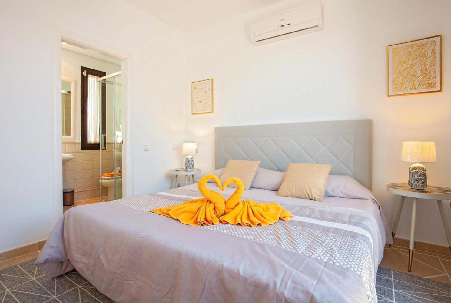 Double bed bedroom with A/C  en suite bathroom and terrace access