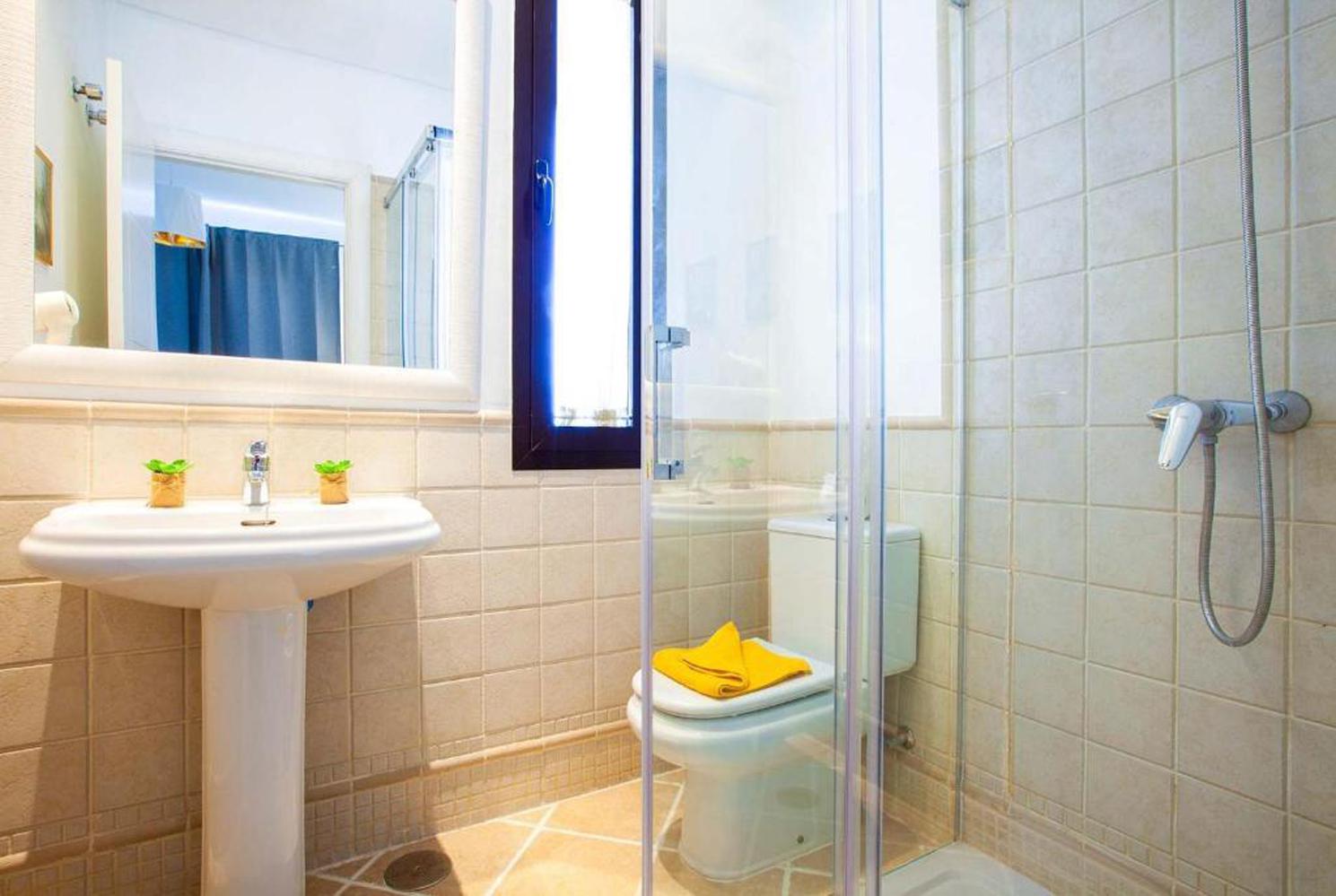 En suite bathroom with shower and WC