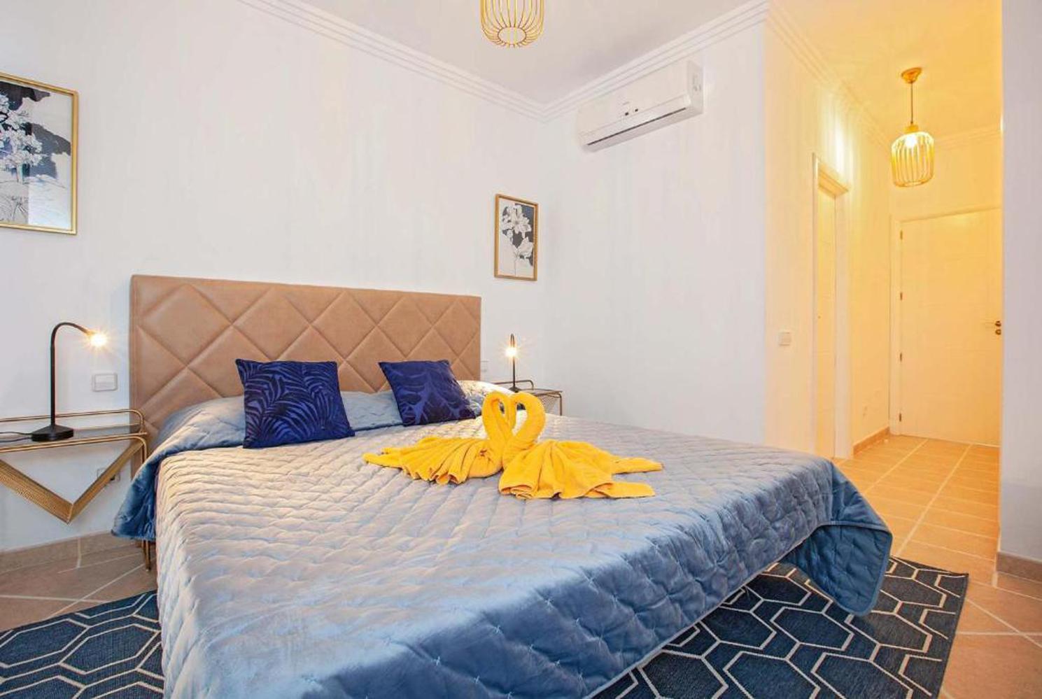 Double bed bedroom with A/C  en suite bathroom and terrace access