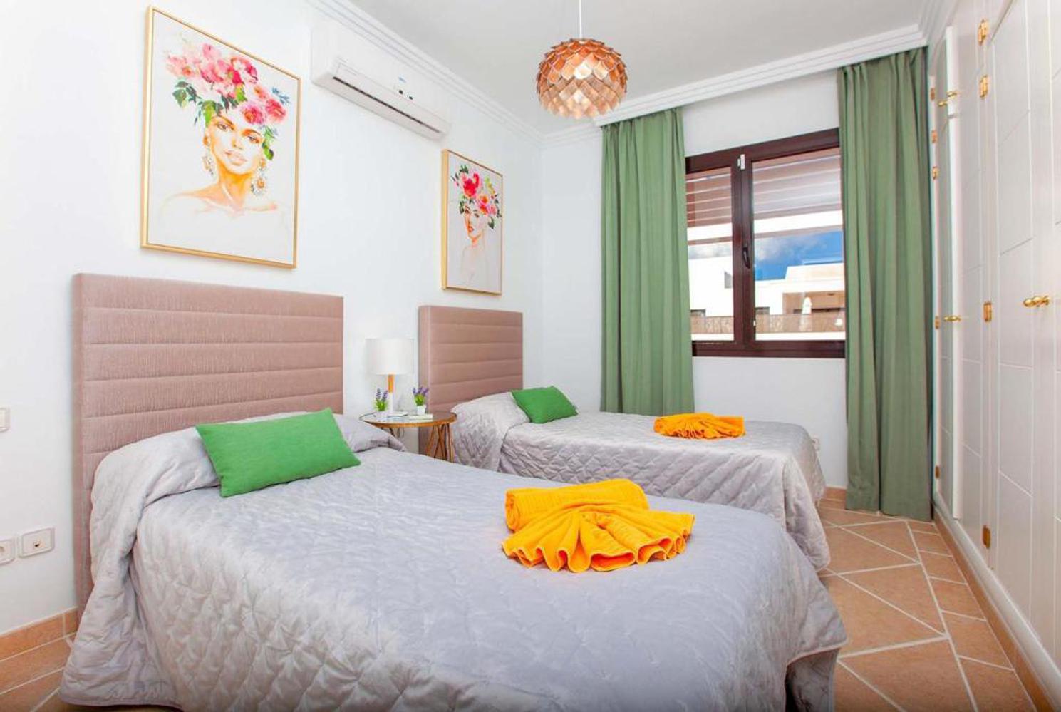 Twin beds bedroom with A/C