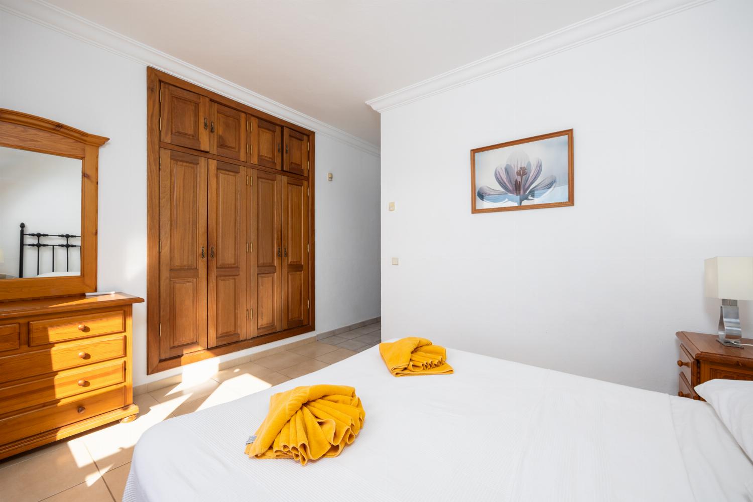 Double bedroom with en suite bathroom, A/C, and sea views
