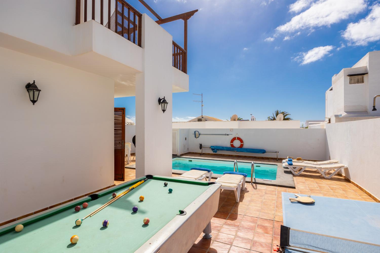 Terrace area with pool table and table tennis