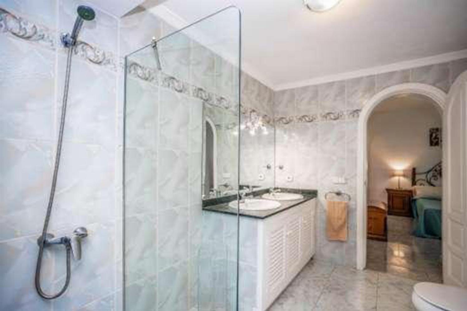 En suite bathroom with shower