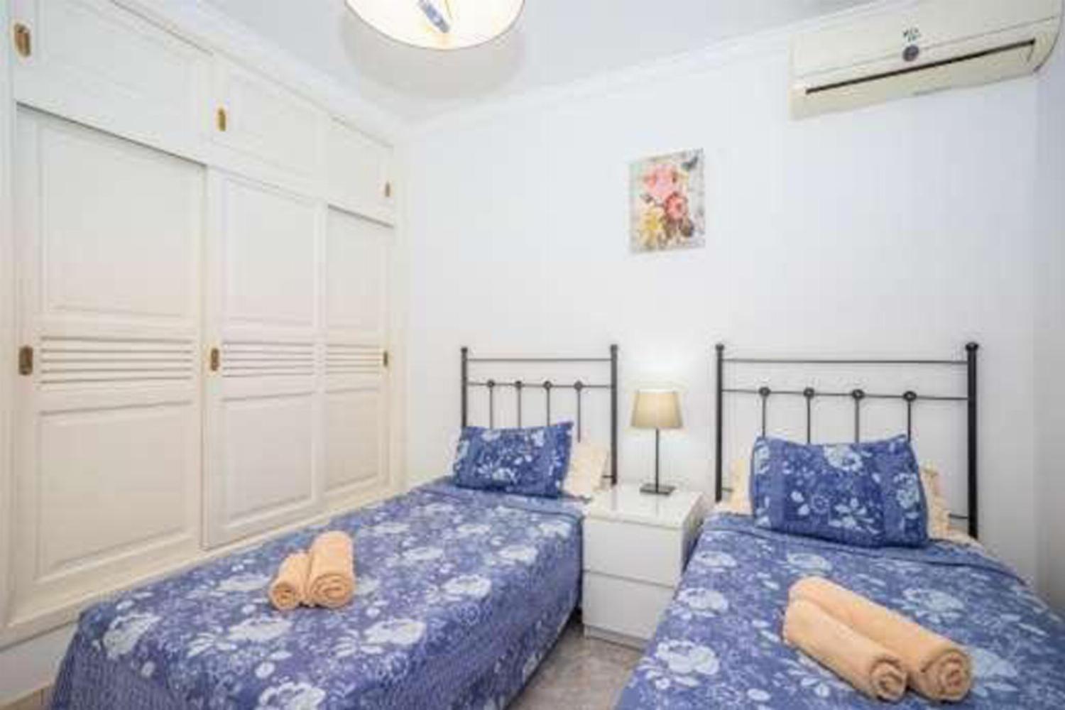 Twin bedroom with A/C