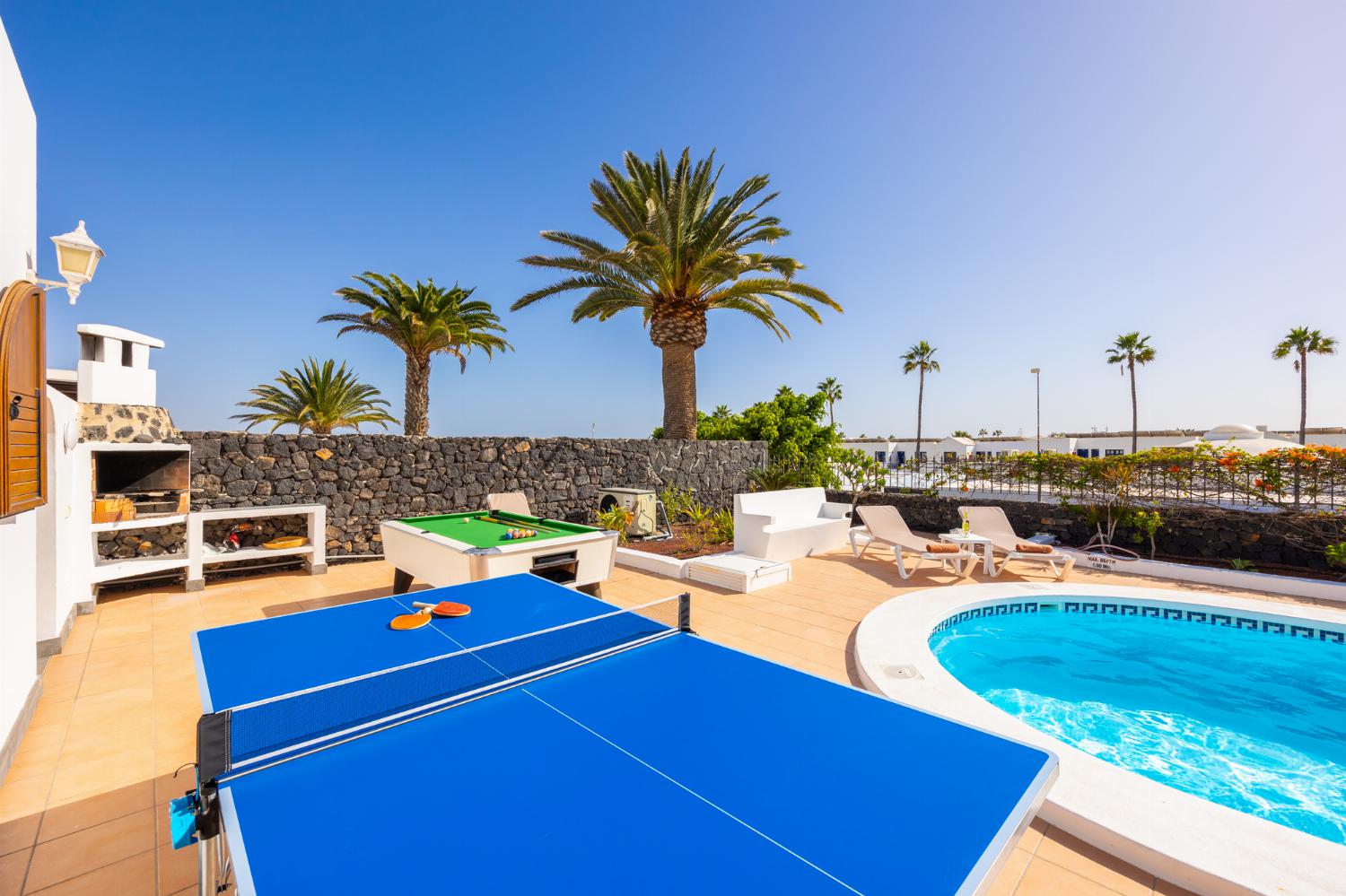 Terrace with table tennis, pool table, and BBQ