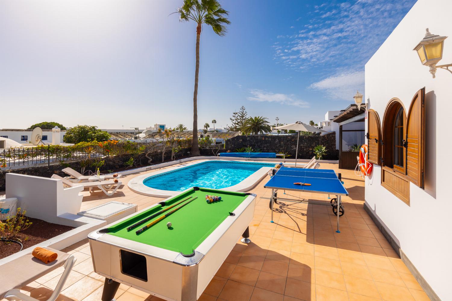 Terrace area with pool table and table tennis