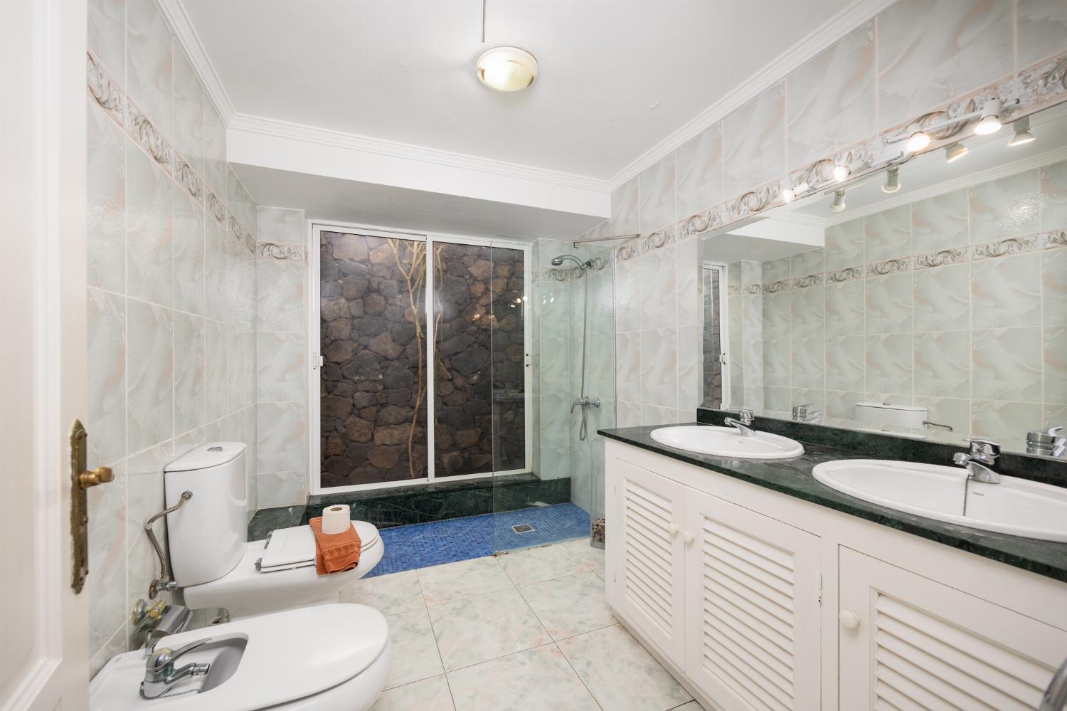 En suite bathroom with shower