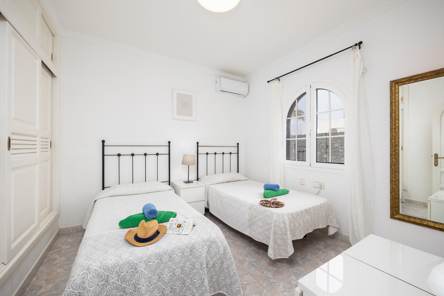 Twin bedroom with A/C