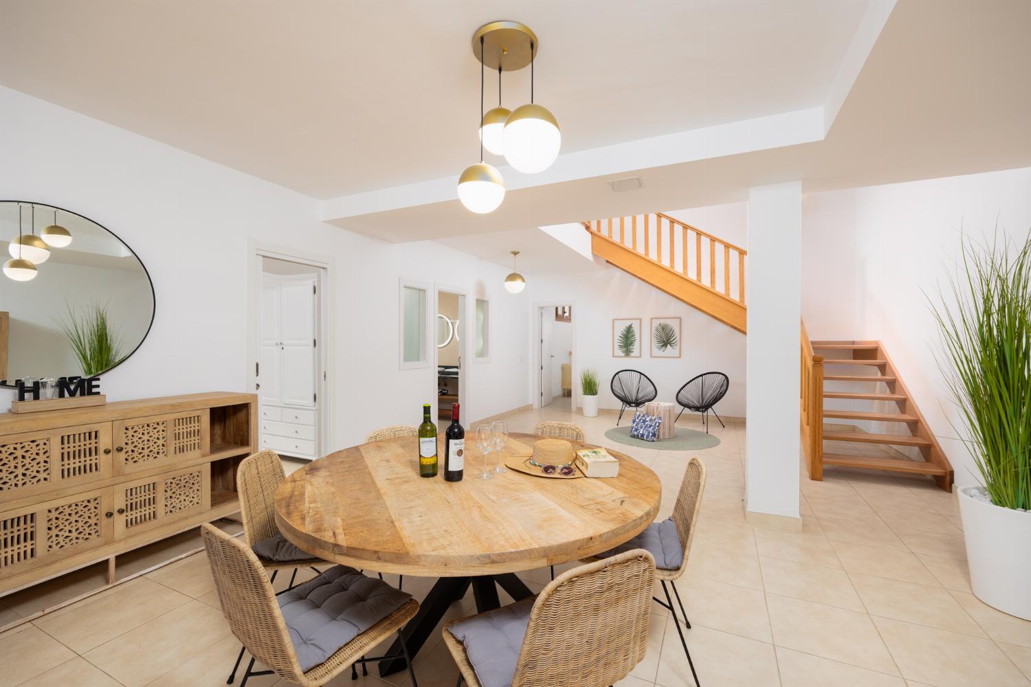 Living room with sofas, dining area, pool table, WiFi internet, and satellite TV