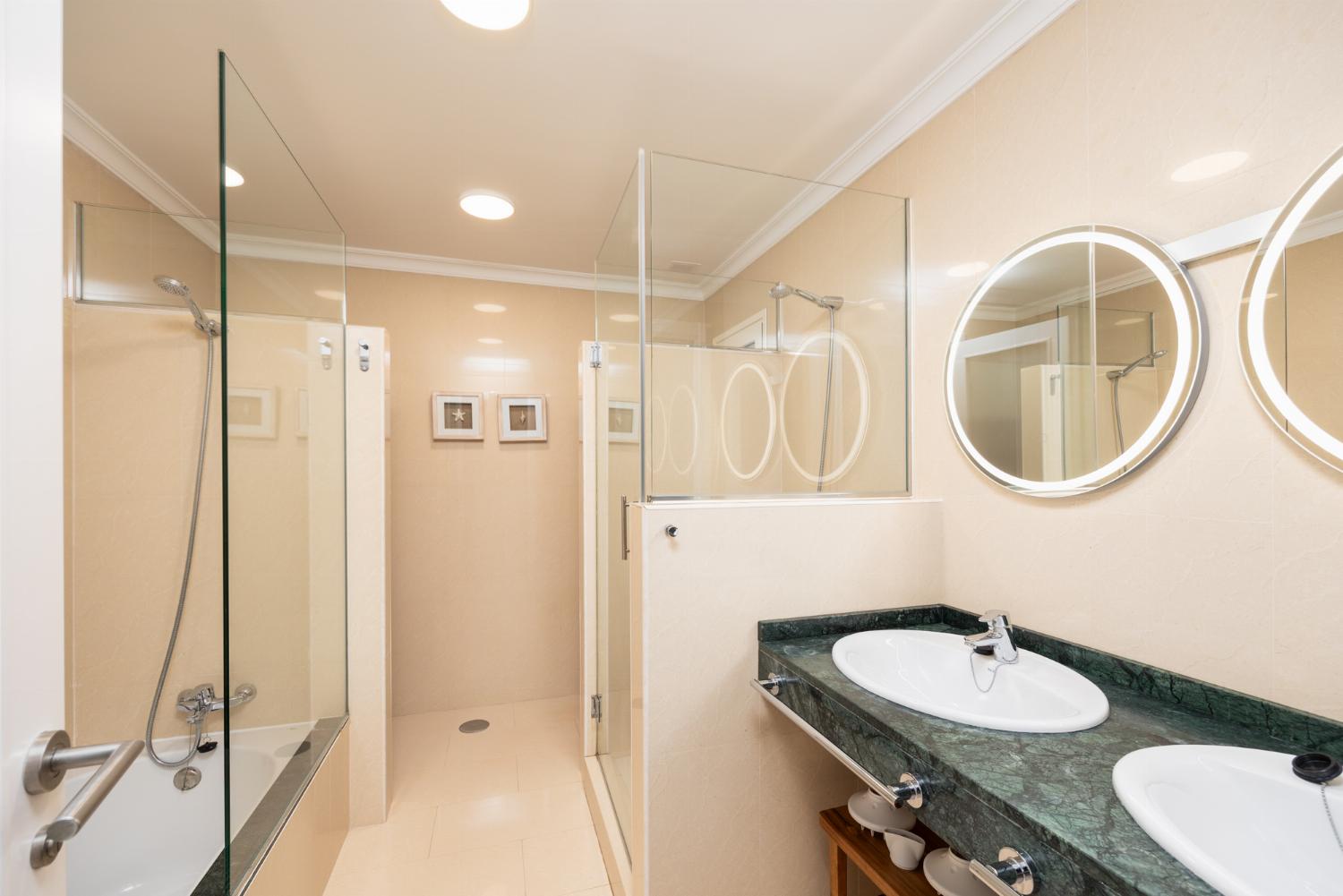 Family bathroom with bath and shower
