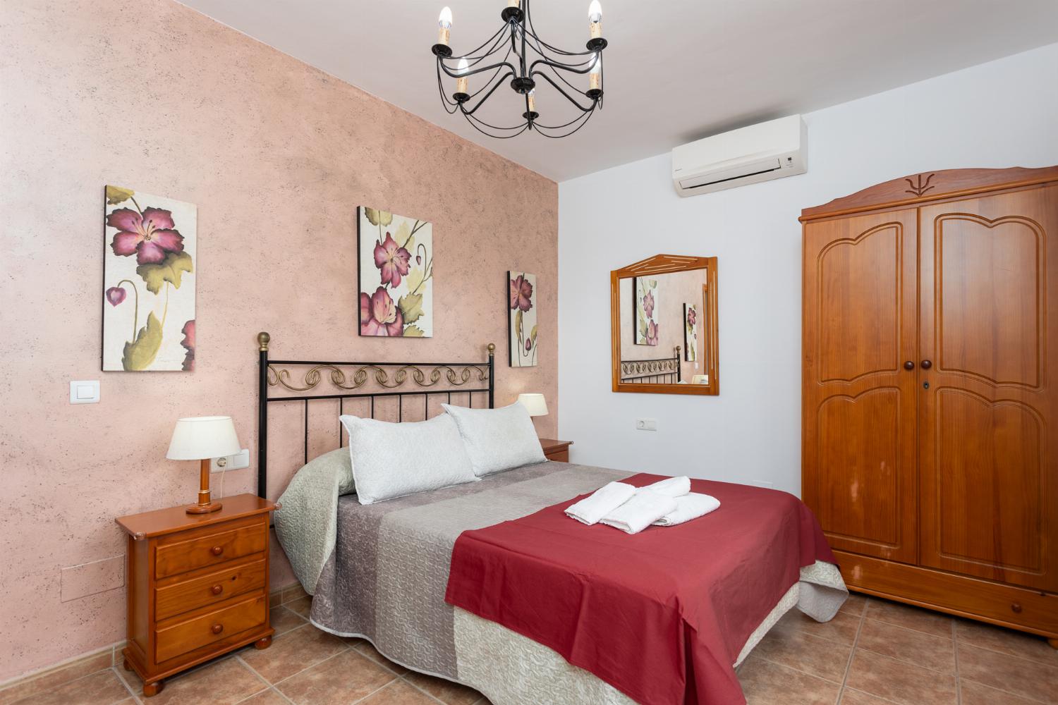 Double bedroom with en suite bathroom and A/C