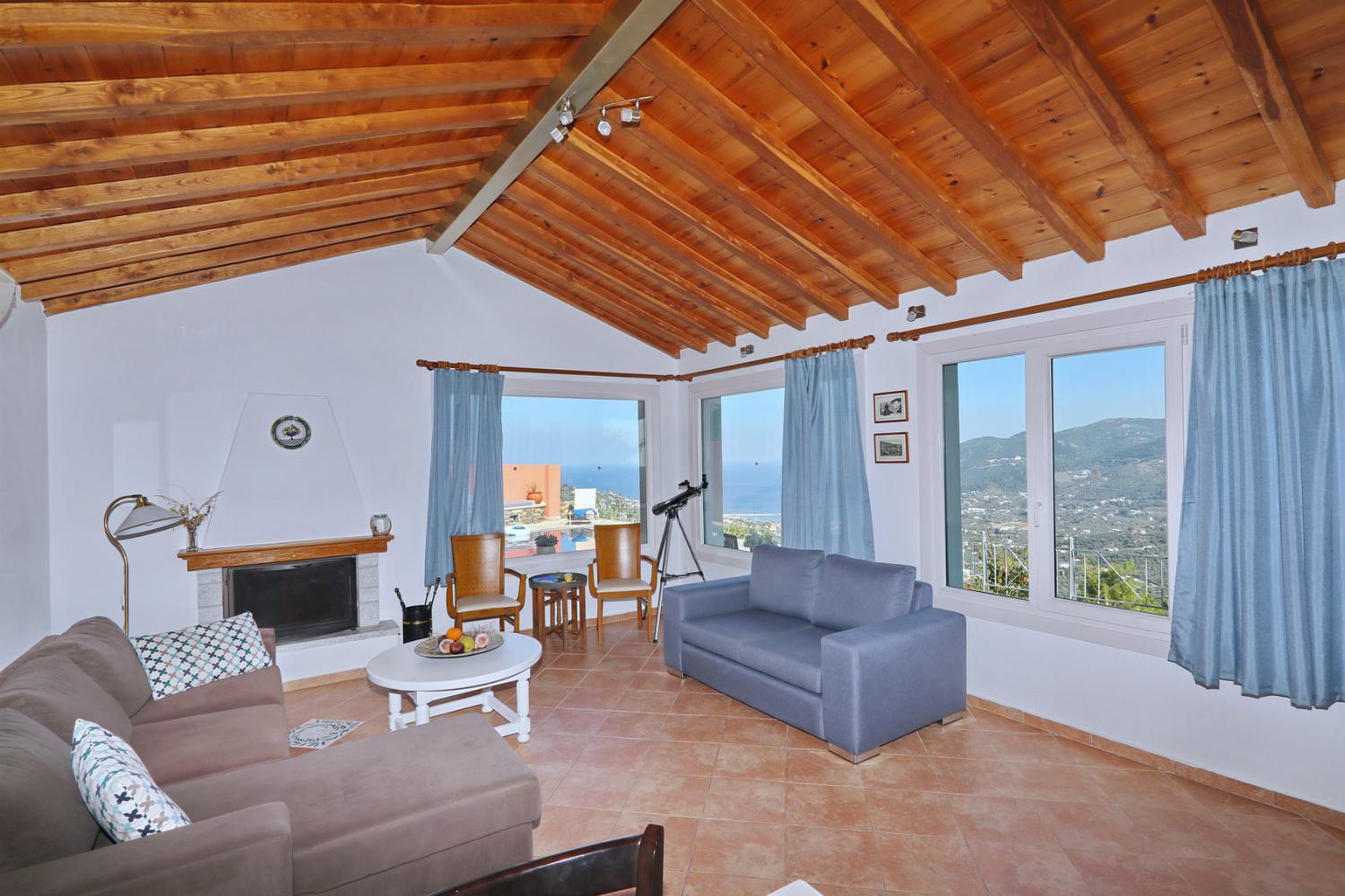 Open-plan living room with sofa, dining area, kitchen, WiFi internet, satellite TV and panoramic views