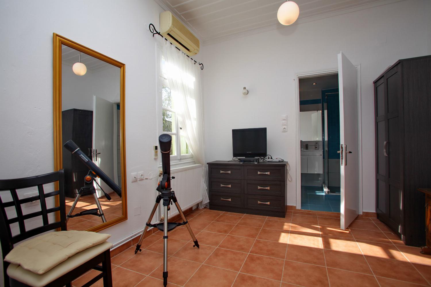 Double bedroom with A/C and en suite bathroom