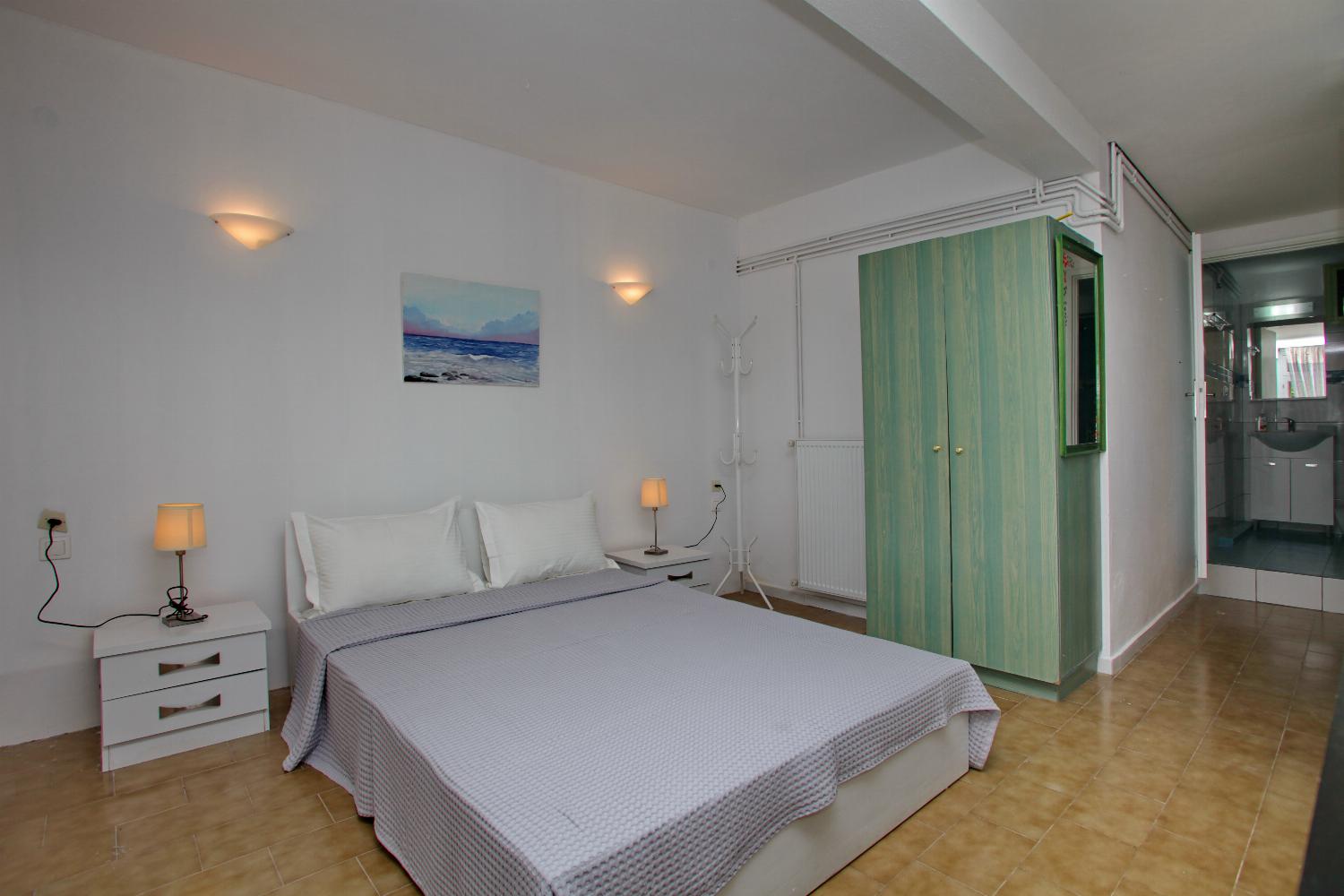 Double bedroom with A/C and en suite bathroom