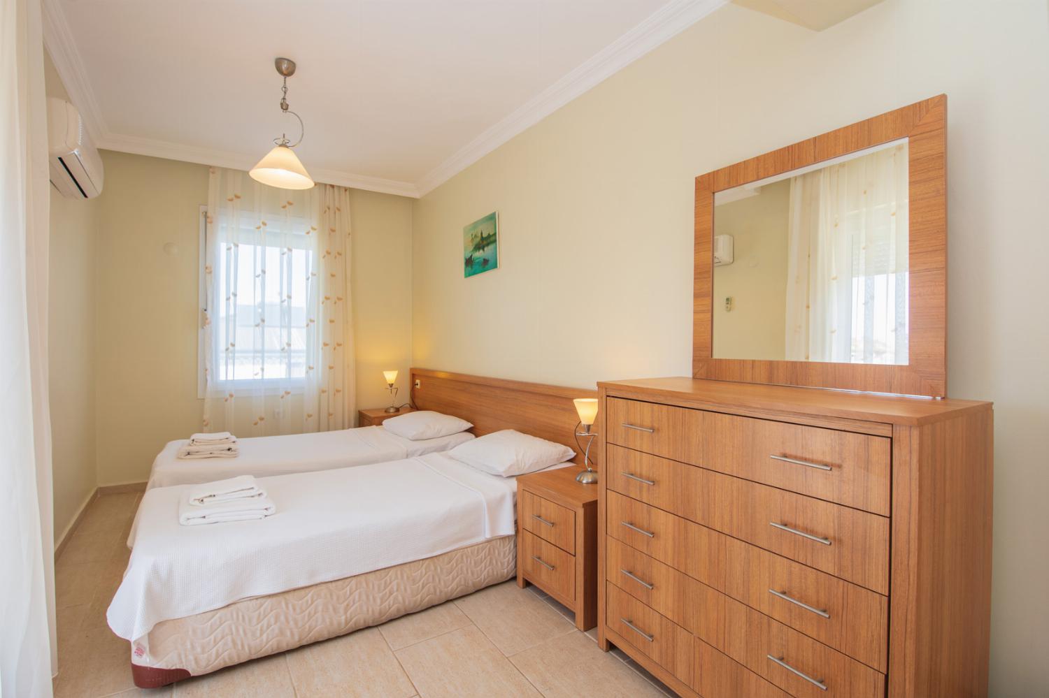 Twin beds bedroom with A/C