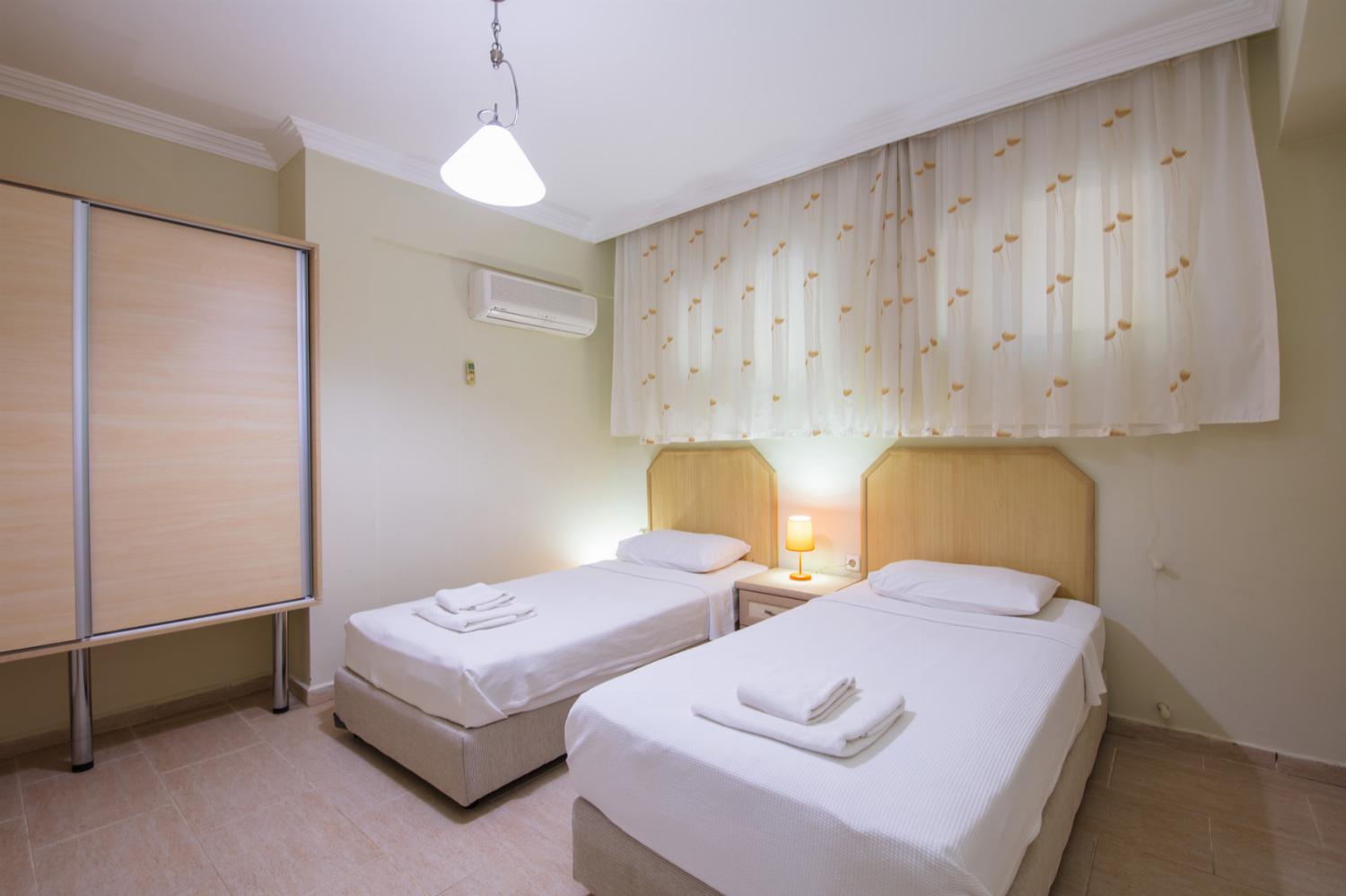 Twin beds bedroom with A/C