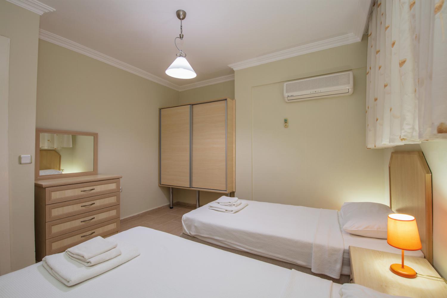 Twin beds bedroom with A/C