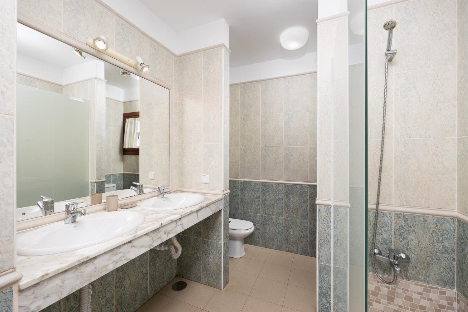 En suite bathroom with shower