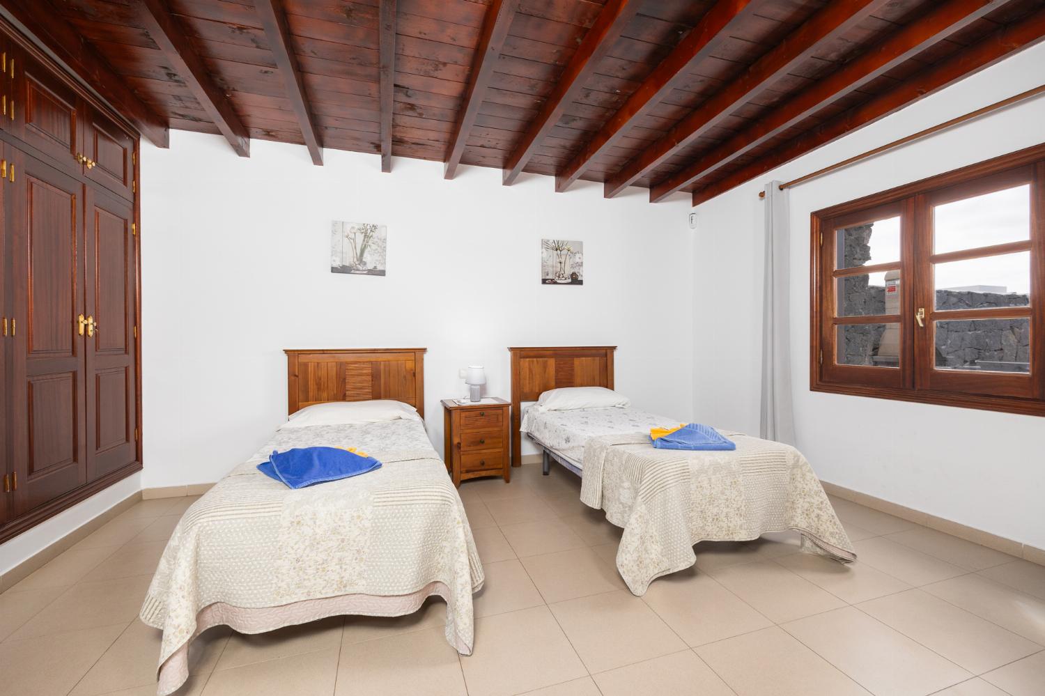 Twin bedroom with A/C