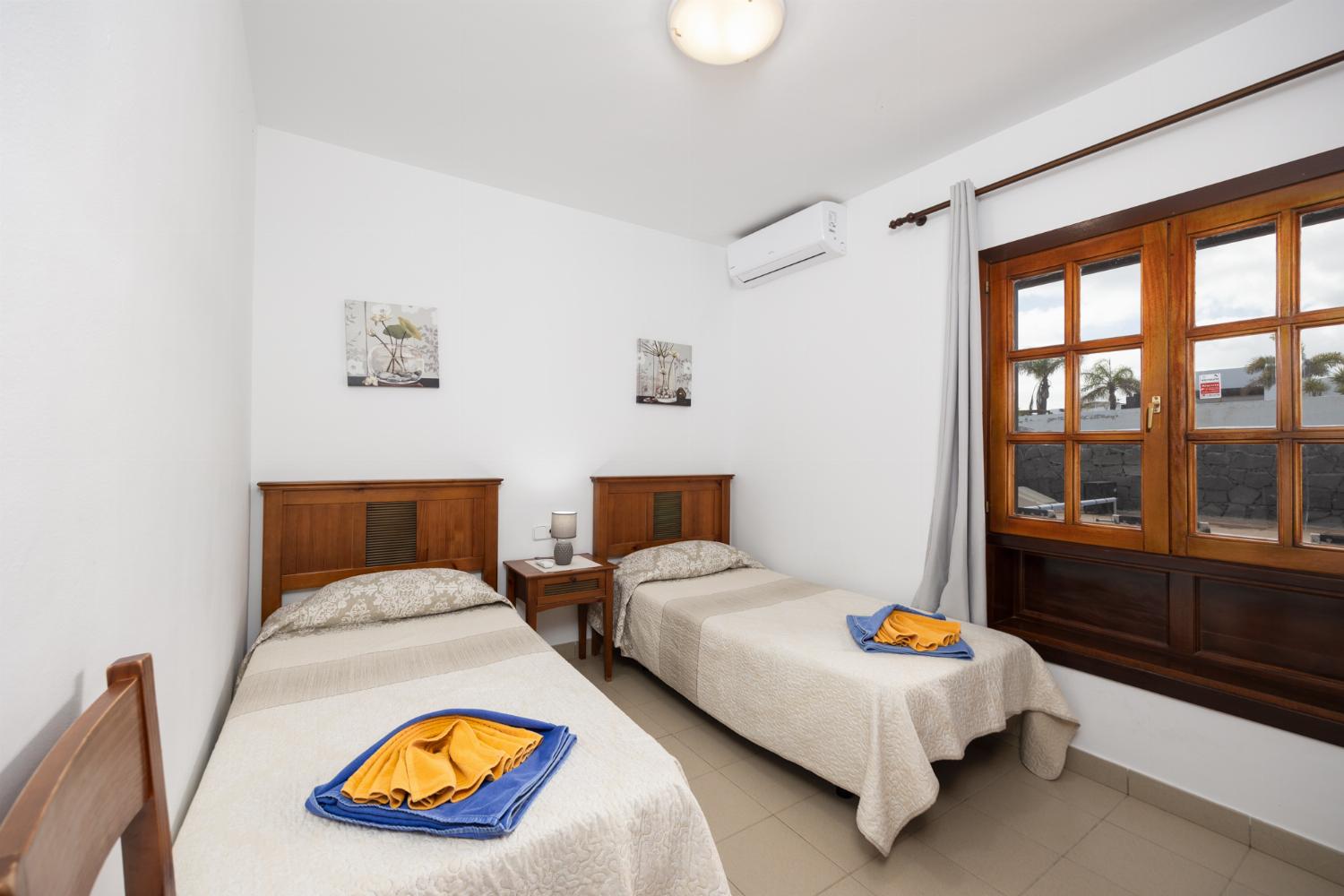 Twin bedroom with A/C