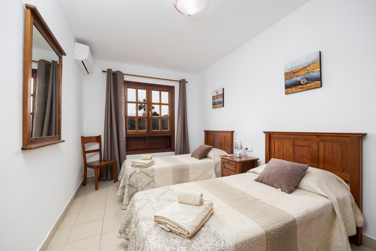 Twin bedroom with A/C