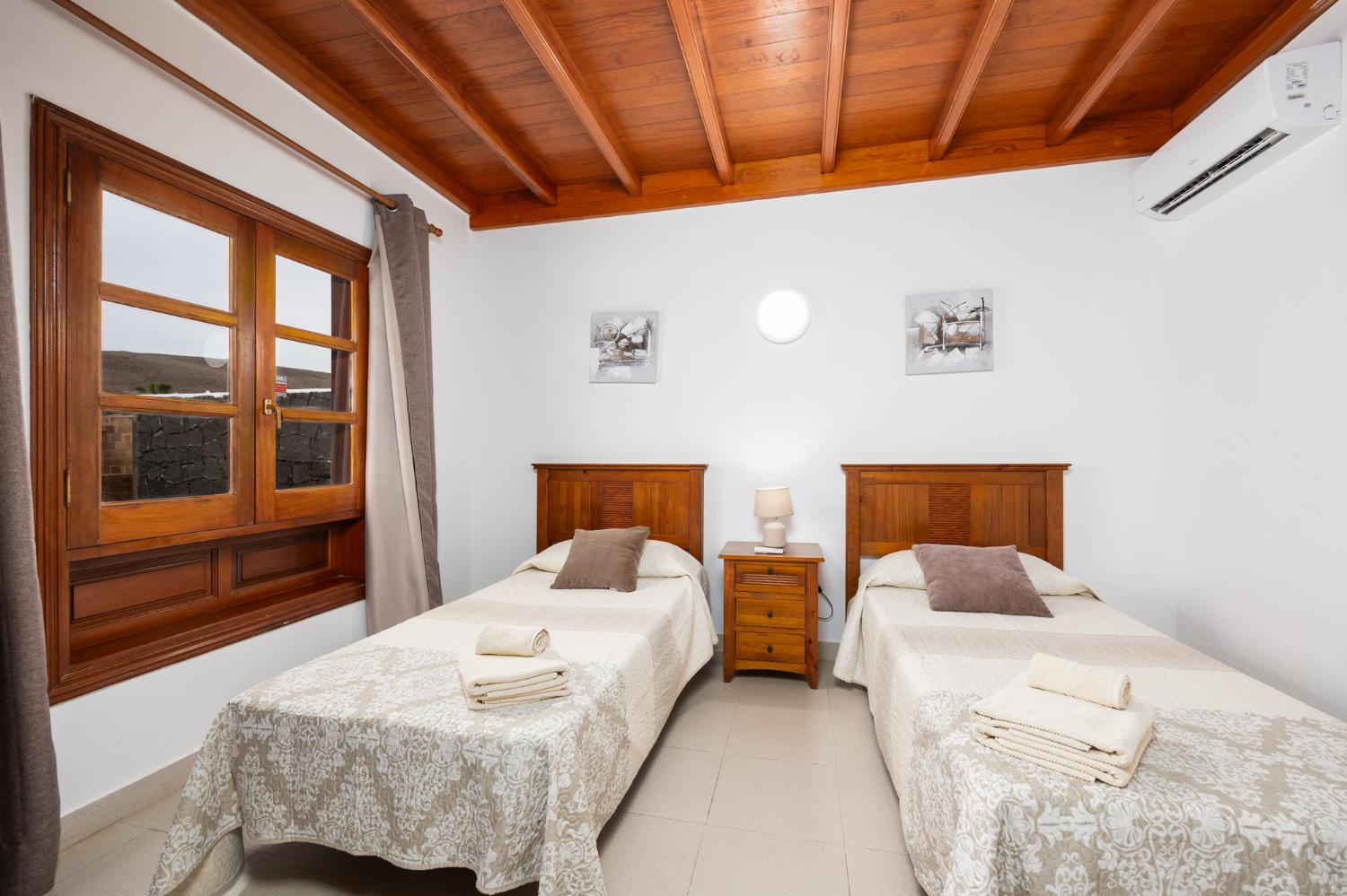 Twin bedroom with A/C