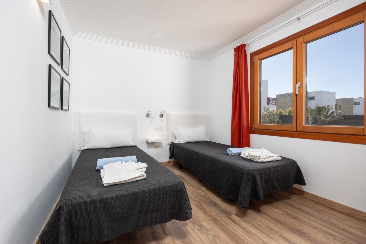 Twin bedroom with A/C