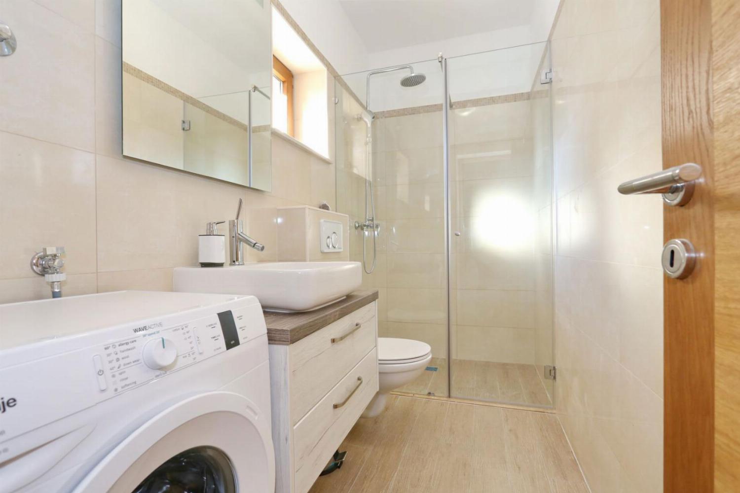 En suite bathroom with shower and WC