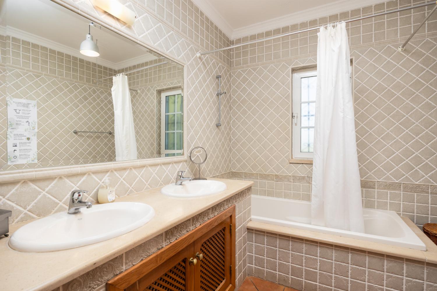 Family bathroom with bath and shower