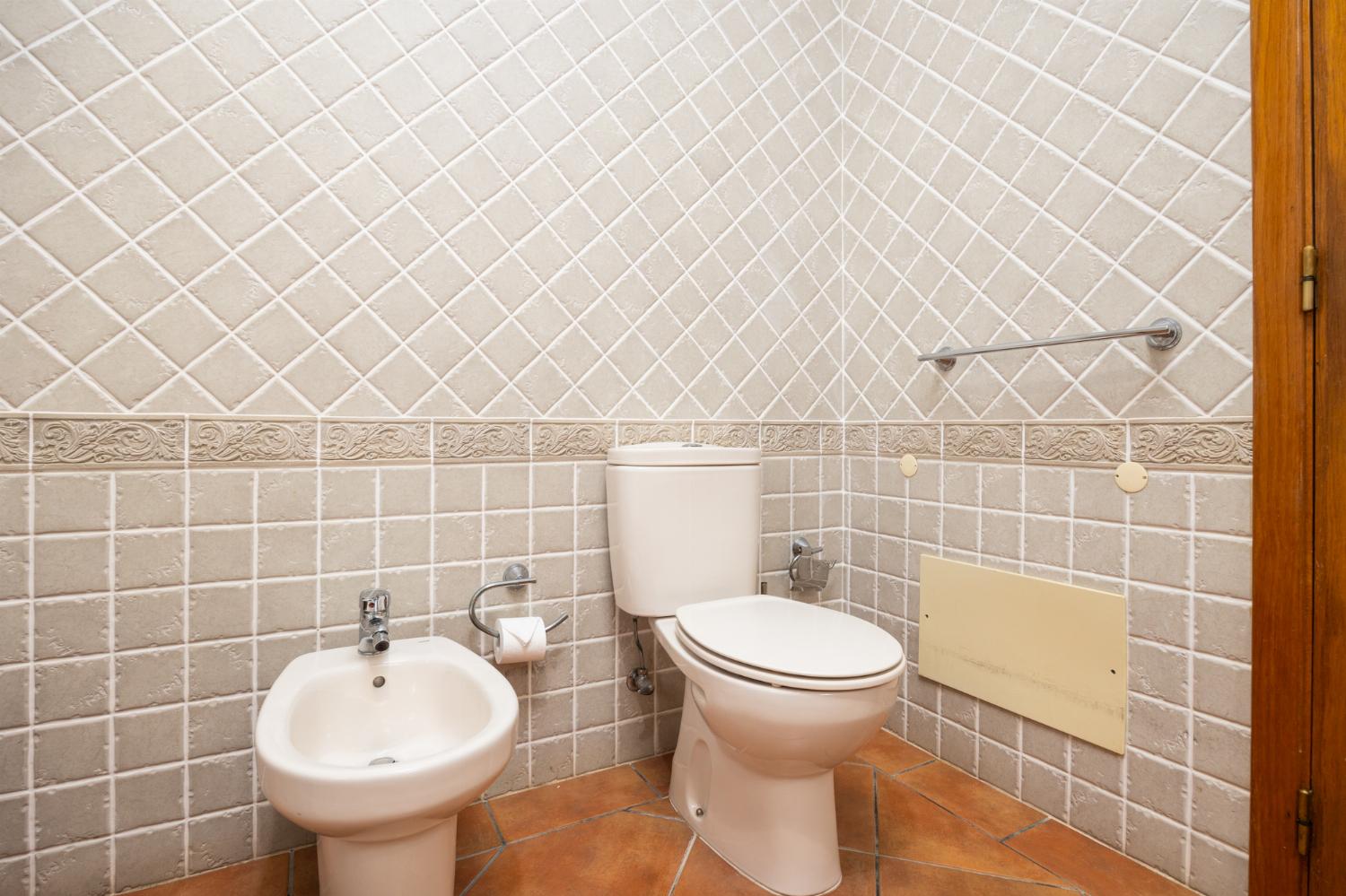 Family bathroom with bath and shower