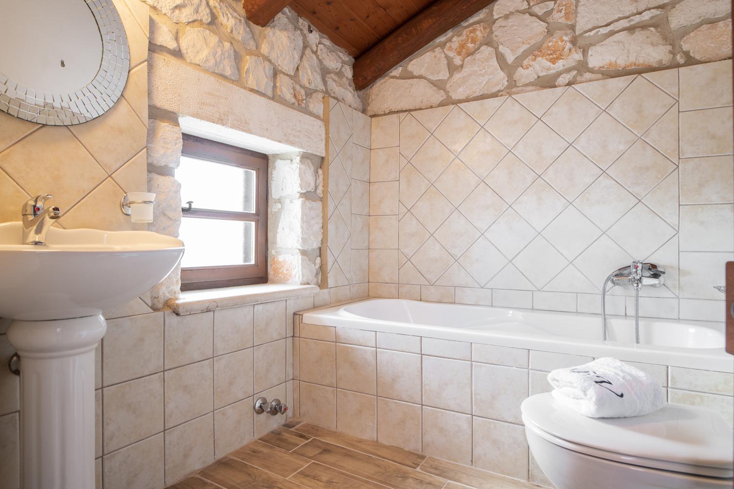 Family bathroom with bath