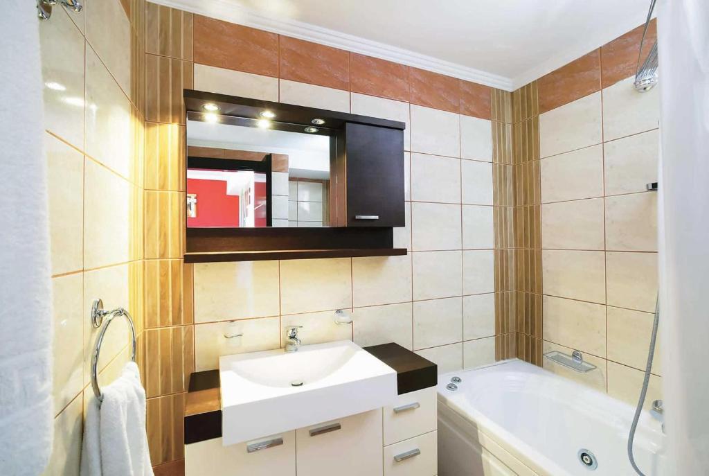 En suite bathroom with bath