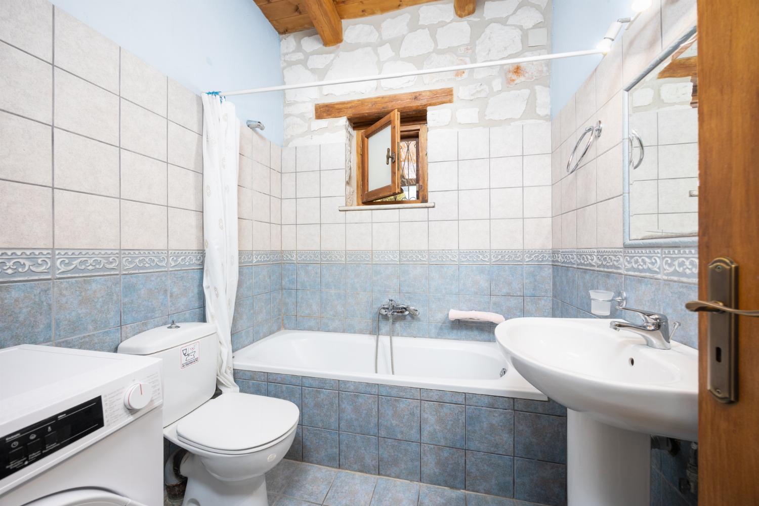 Family bathroom with bath and shower