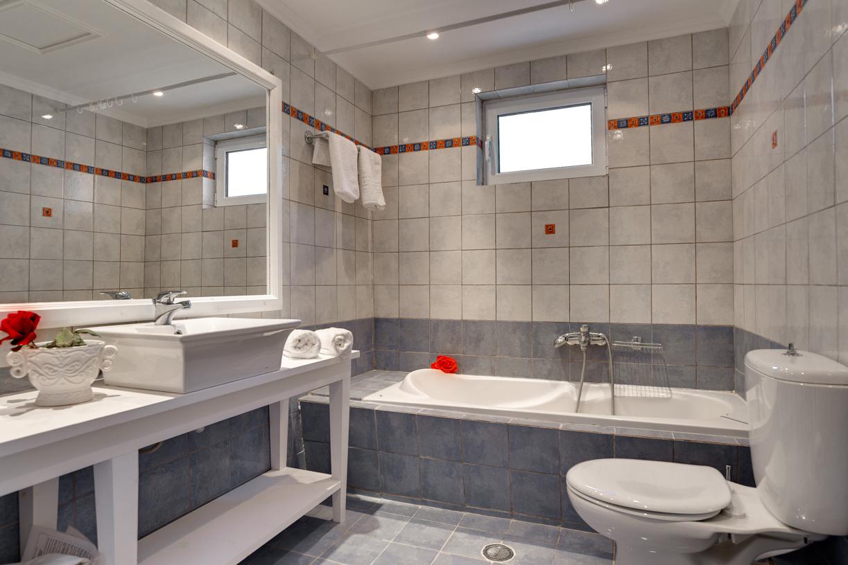 Family bathroom with bath