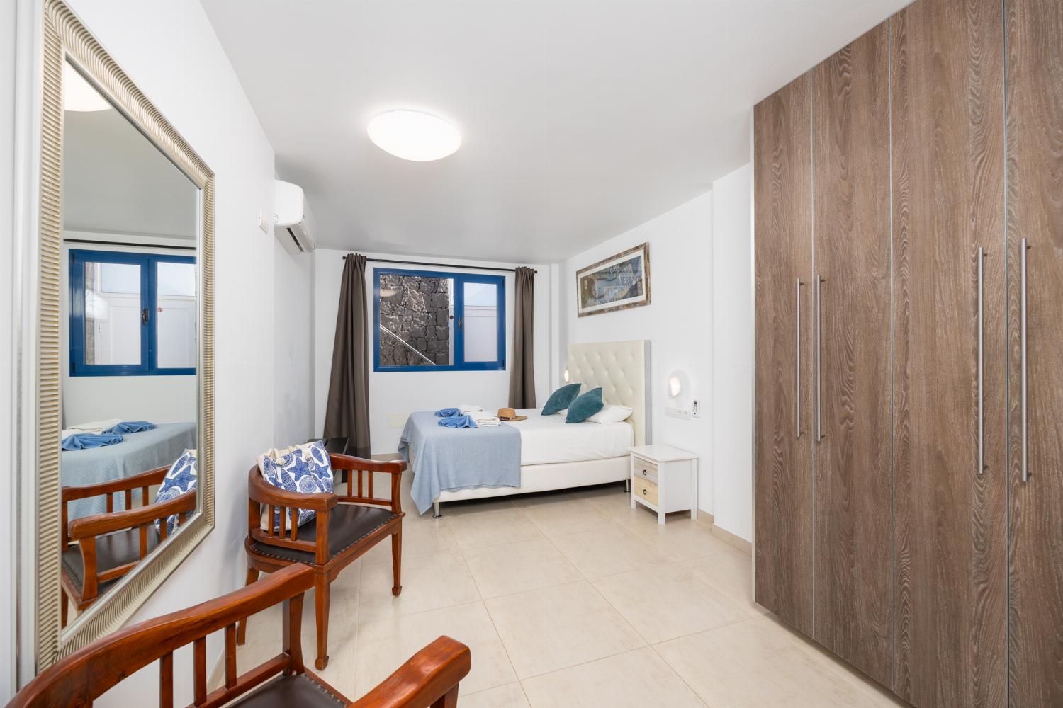 Double bedroom with en suite bathroom and A/C