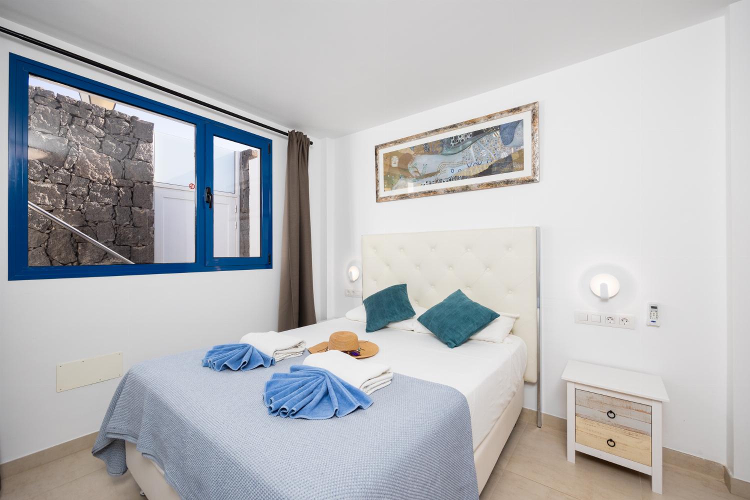 Double bedroom with en suite bathroom and A/C
