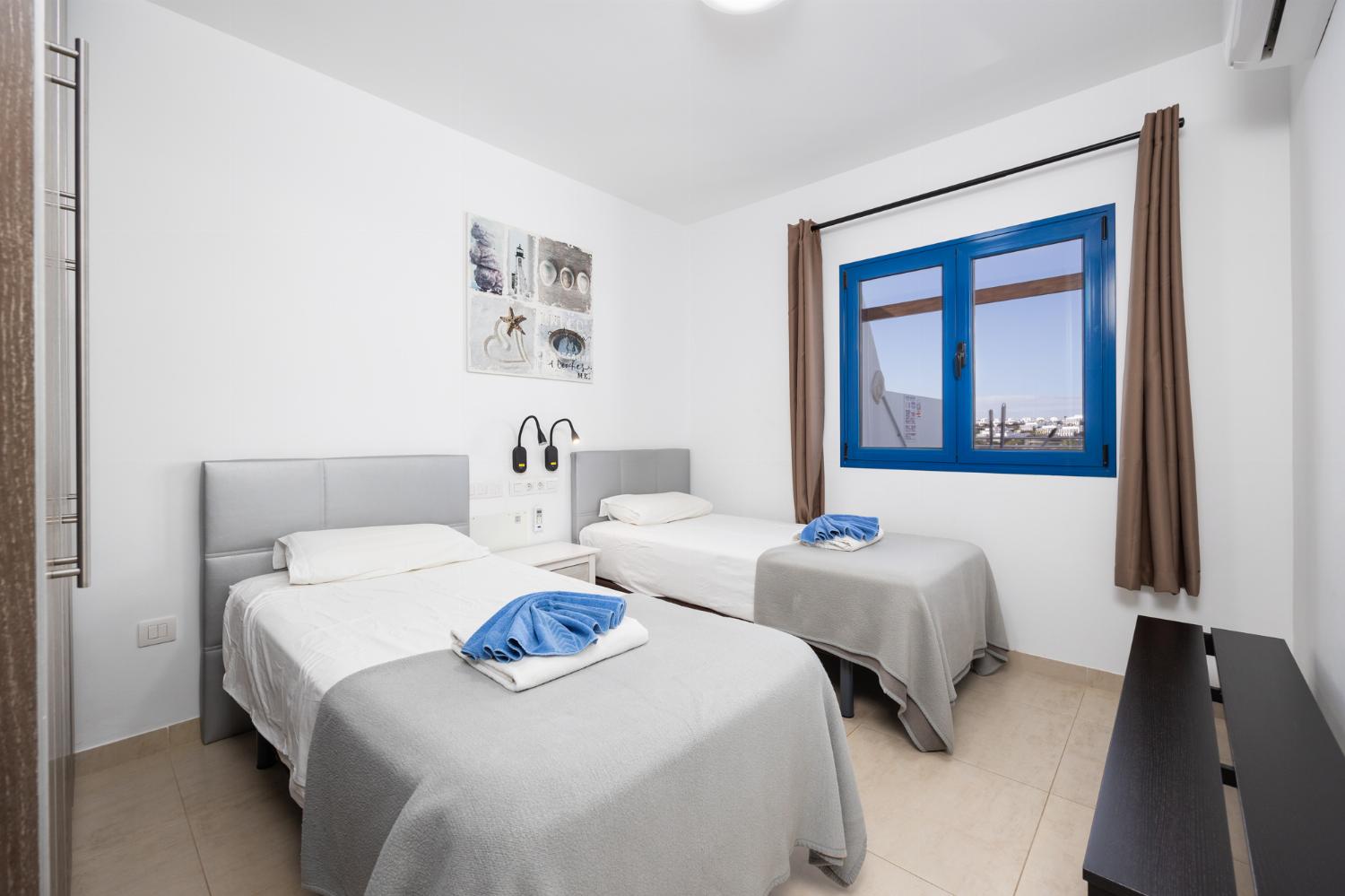 Twin bedroom with A/C