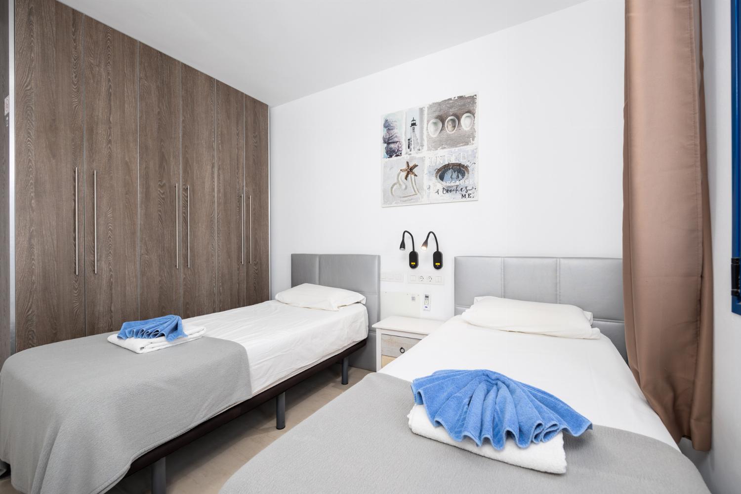 Twin bedroom with A/C