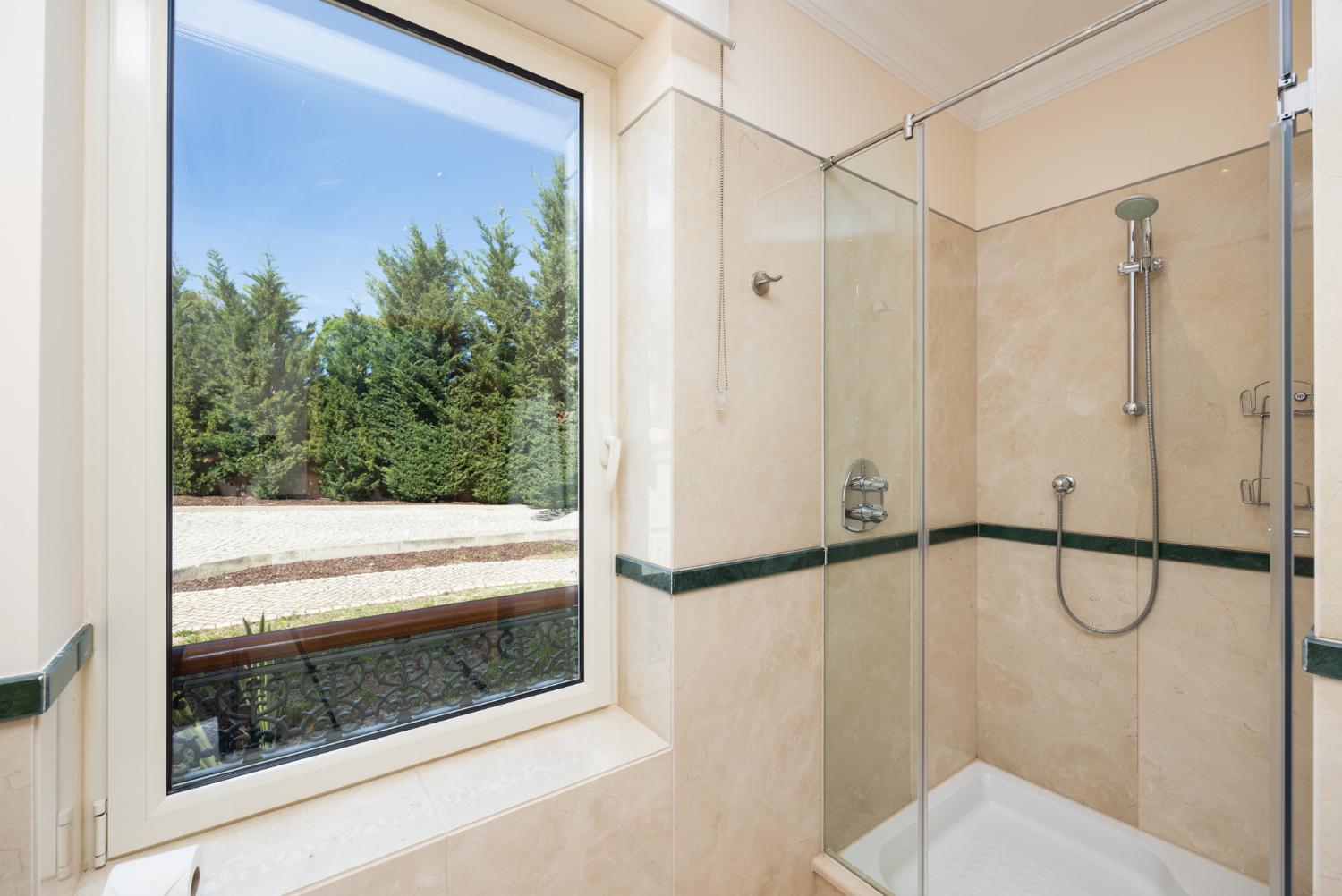 En suite bathroom with shower