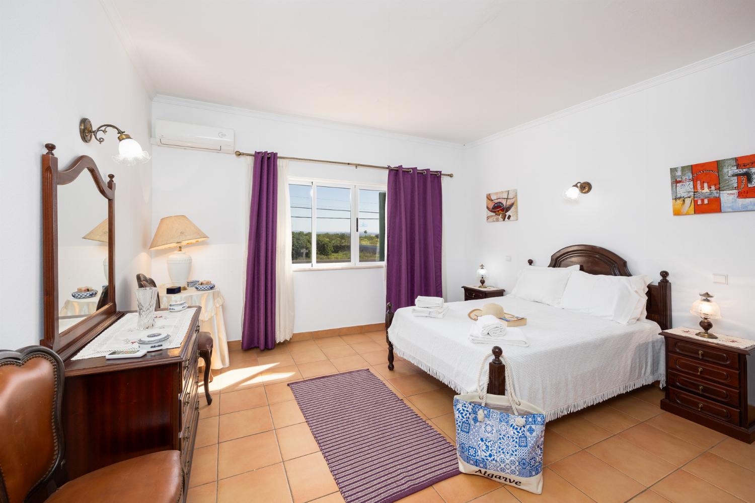 Double bedroom with en suite bathroom and A/C