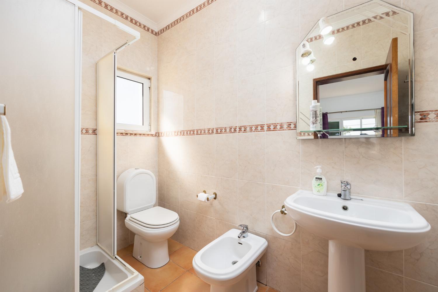 En suite bathroom with shower