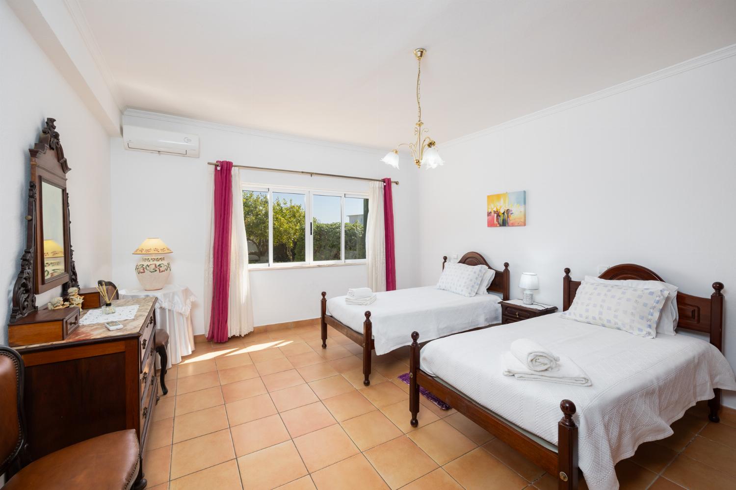 Twin bedroom with A/C