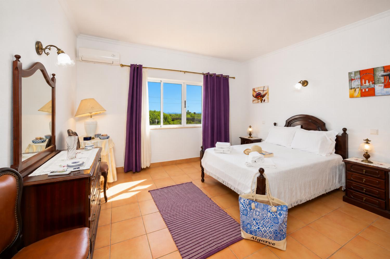 Double bedroom with en suite bathroom and A/C