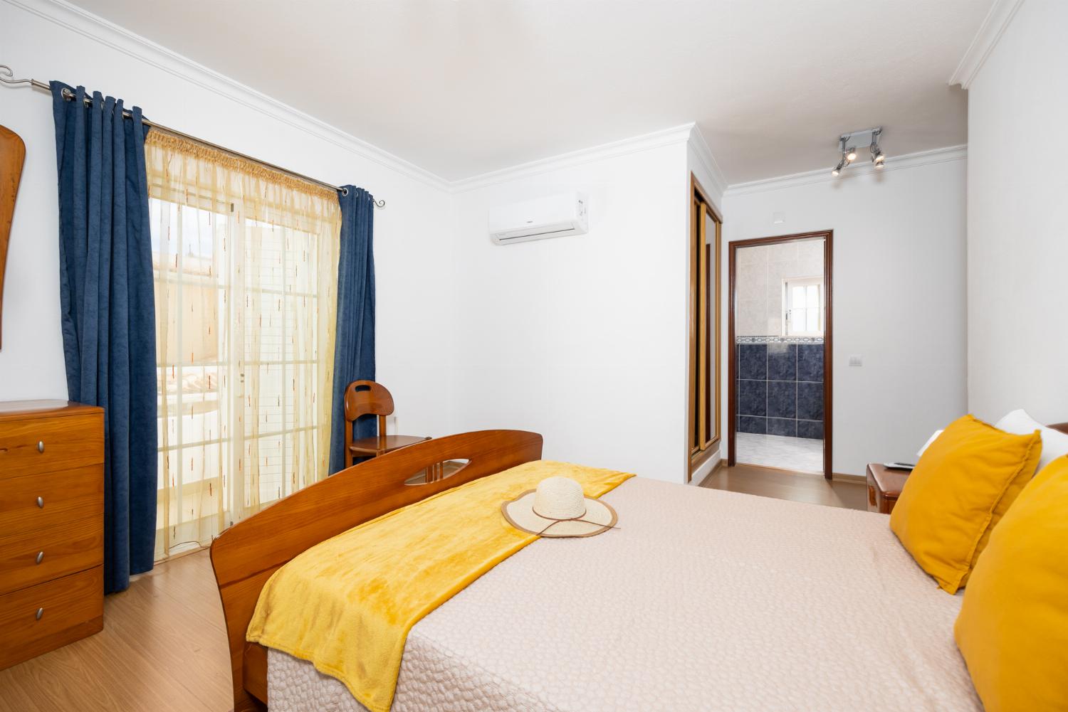 Double bedroom with en suite bathroom and A/C